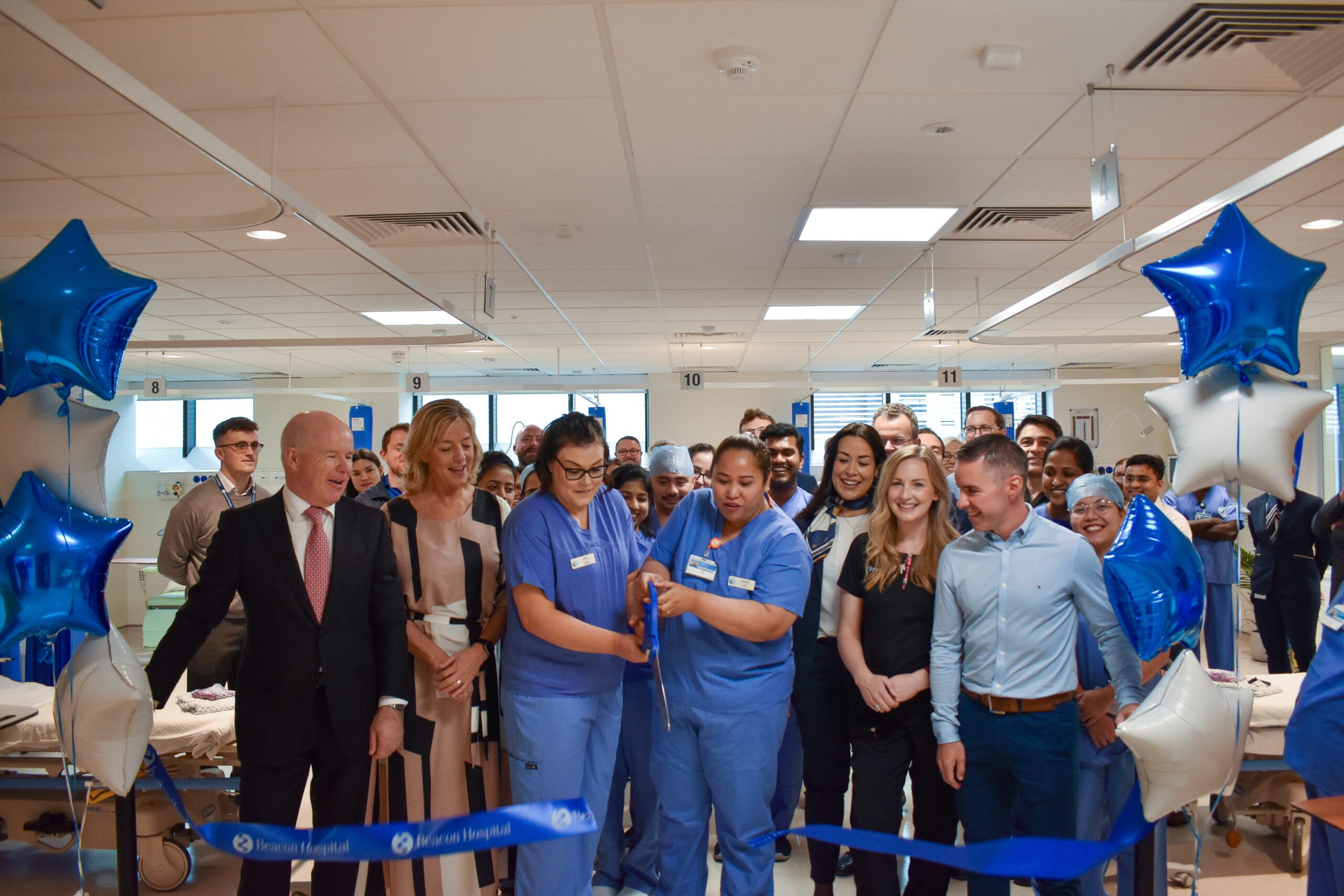 Cutting the Ribbon at the Opening of our New Cath Lab Admissions and Recovery Area